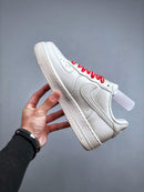 TÊNIS NIKE AIR FORCE 1 TRIPLE WHITE x SUPREME - Lagrife Sport